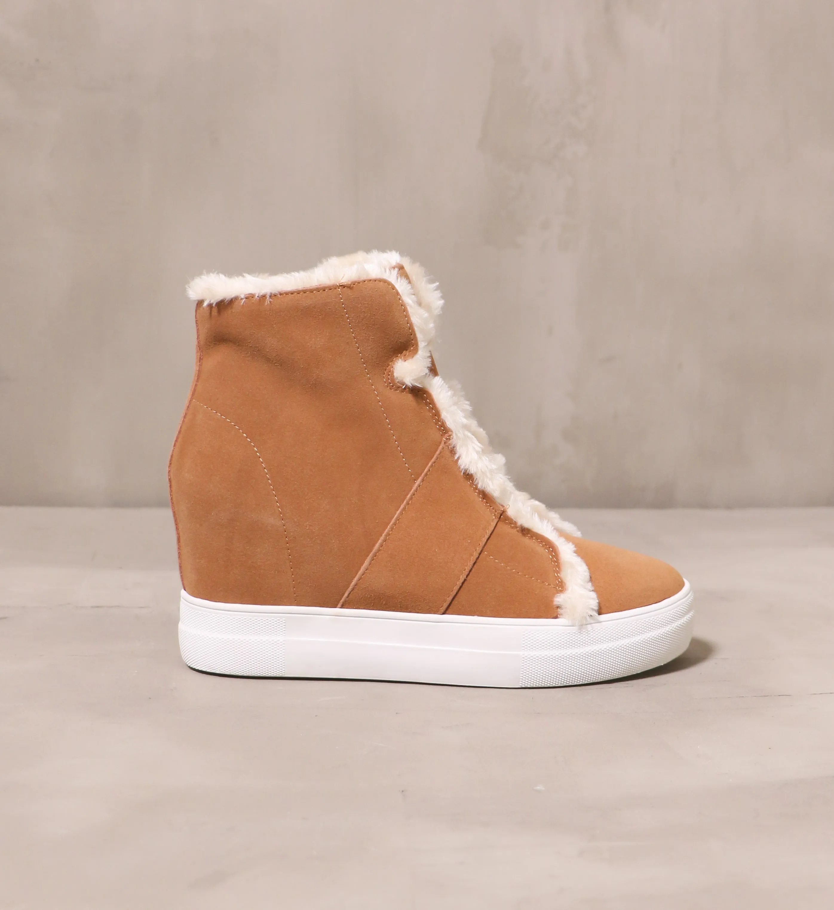FUR WEDGE AND FUR ALL BOOT