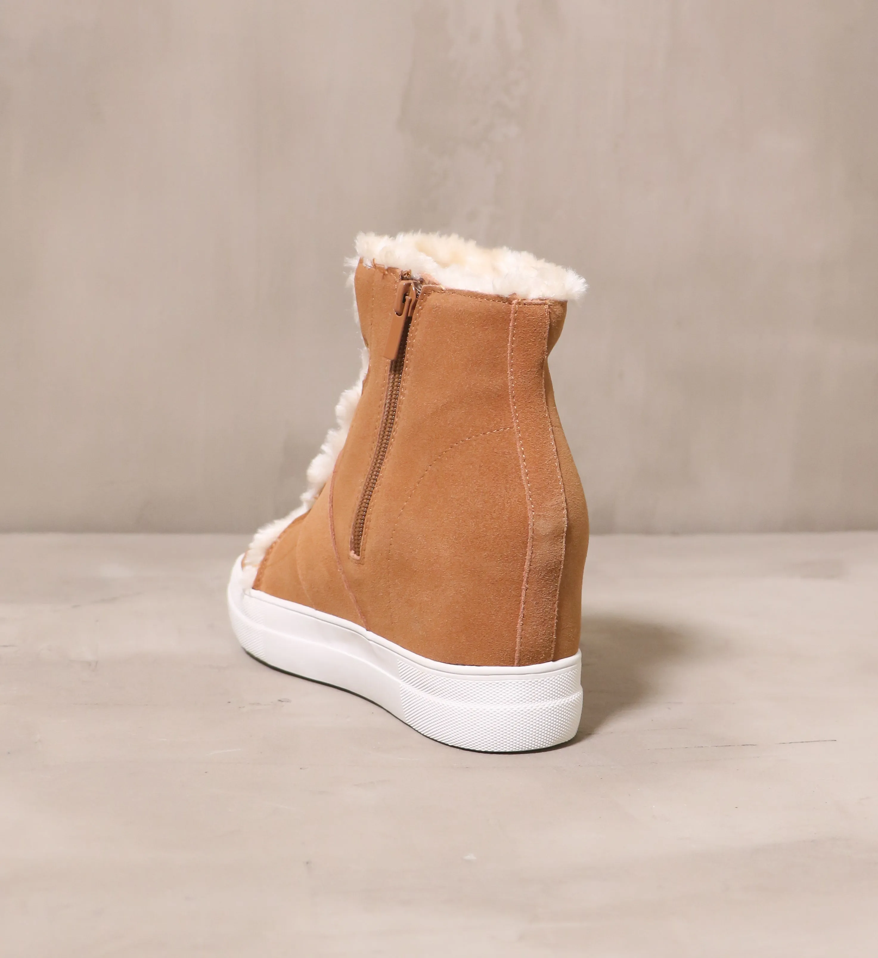 FUR WEDGE AND FUR ALL BOOT